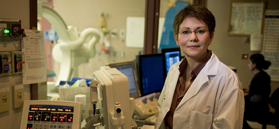 CHÉOS Program Head of Cardiovascular Health Dr. Karin Humphries in medical lab, medical device clinical studies